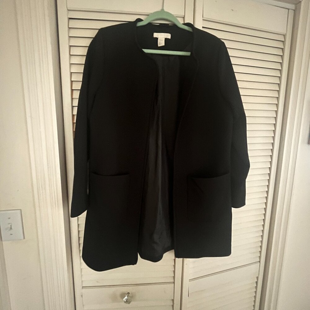 Black riding coat.